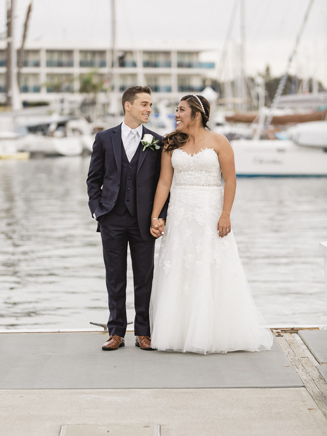 New-Jersey-Photographer-Bride and Groom on Pier in wedding attire