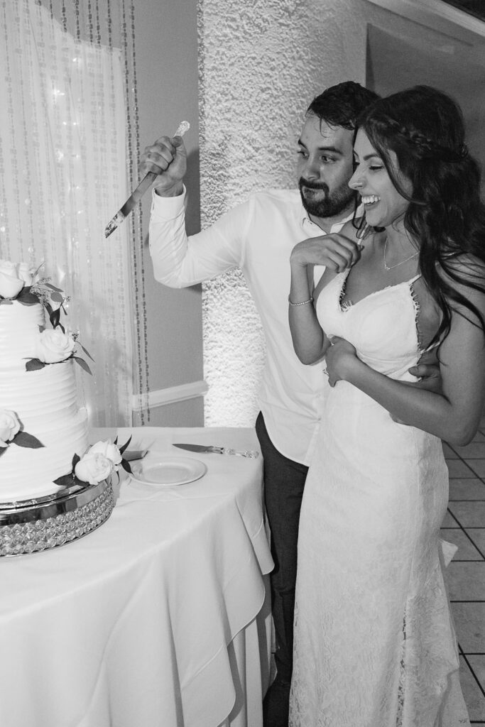 Las Vegas Summer Wedding- The Grove- cutting cake