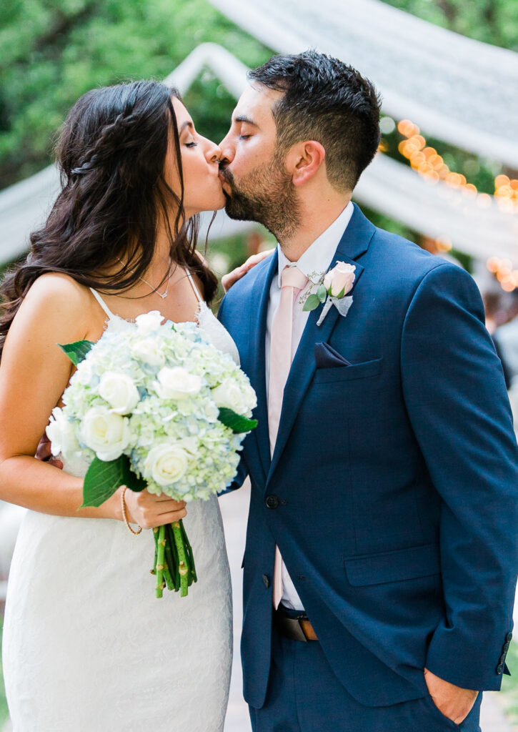 Las Vegas Summer Wedding- The Grove- outdoor wedding- just married- the kiss