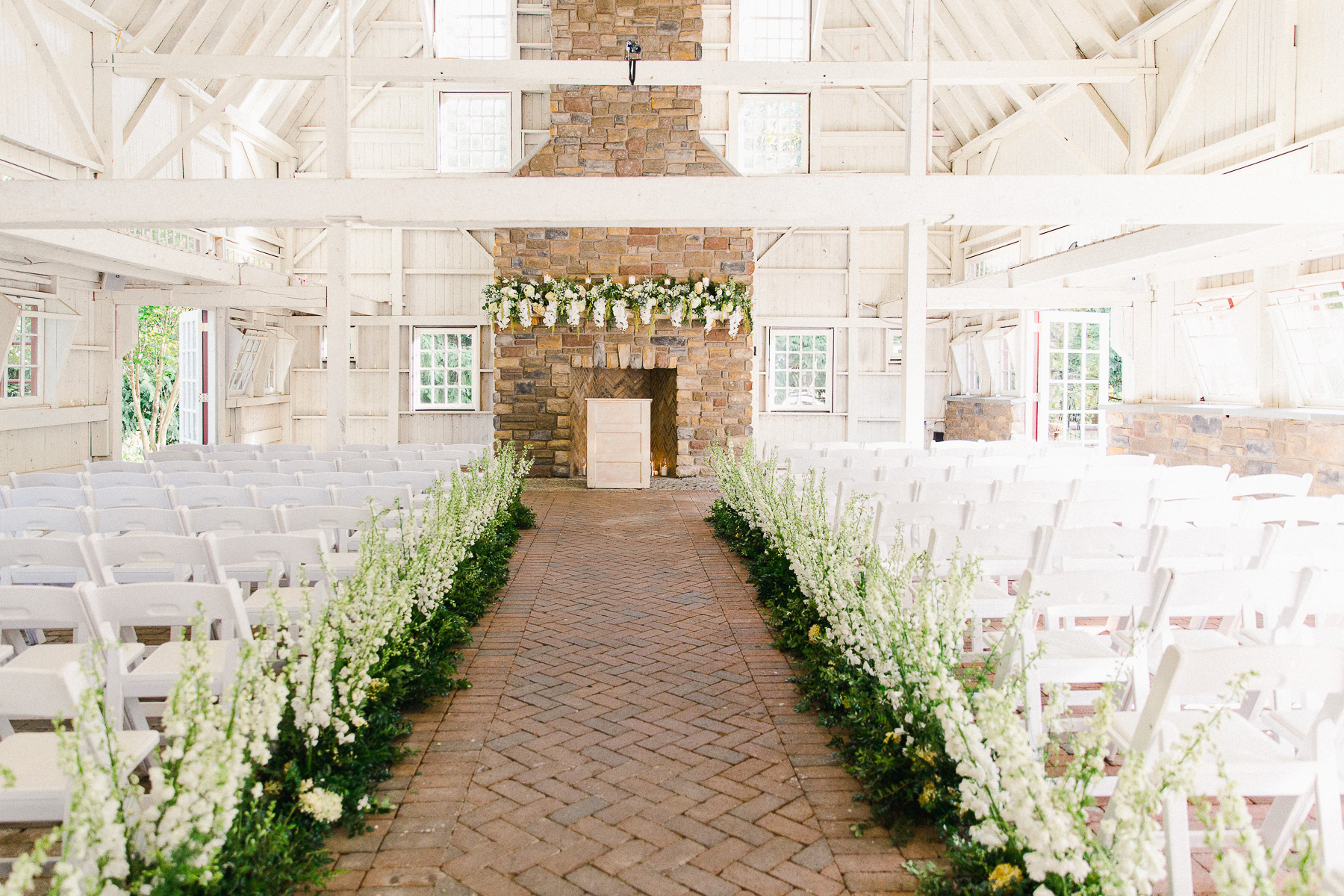 new-jersey-photographer-ceremony-ashford-estate-white-chairs-wedding-floral