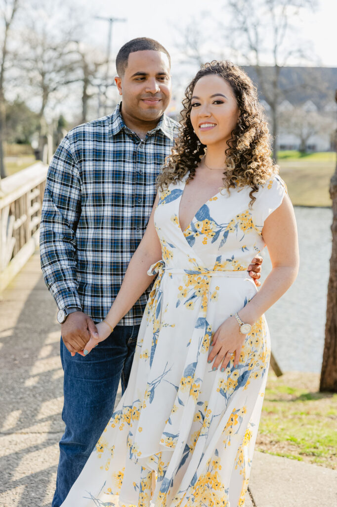 Man and women pose in in Spring Lake New Jersey for engagement session photos by Simone Jaramillo Photography