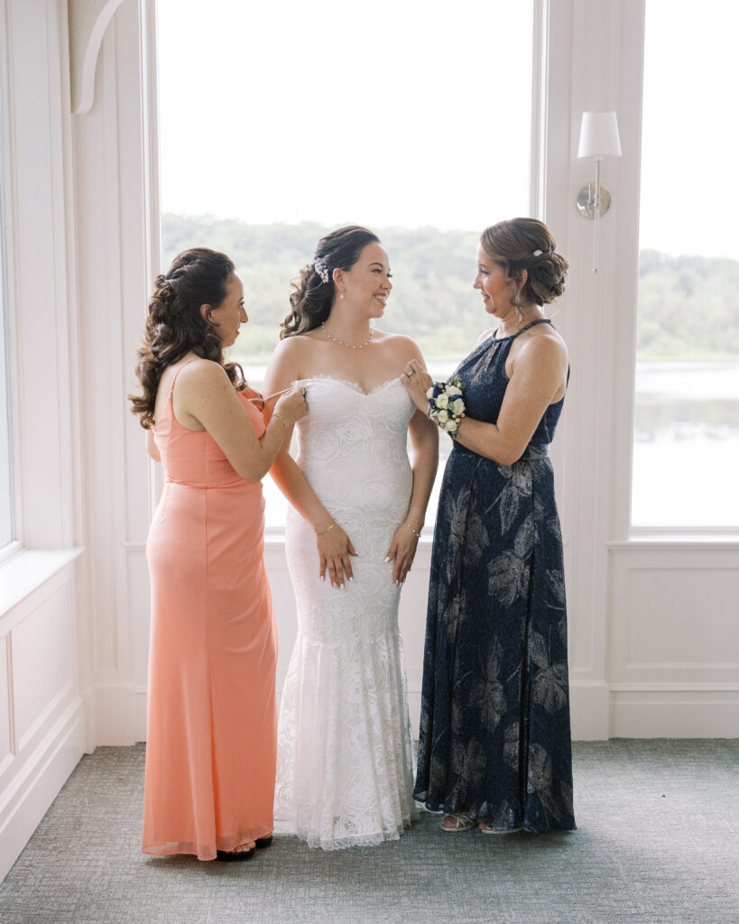 bride getting ready with her mother and bridesmaid at The Mill Lakeside Manor