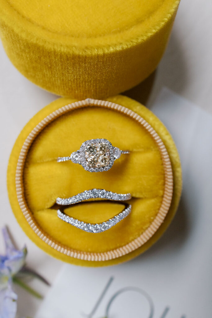 Bridal jewelry with yellow diamond with halo in white gold setting