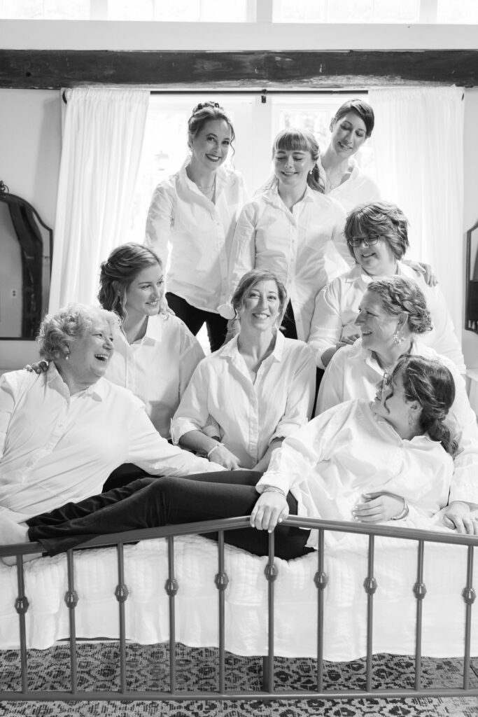 Bridal party black and white photo, ladies with white collard shirts for getting ready photos