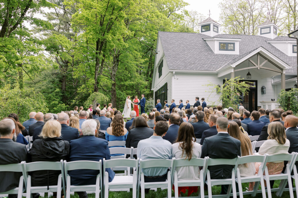 Ceremony in the lawn at the Inn at Millrace Pond