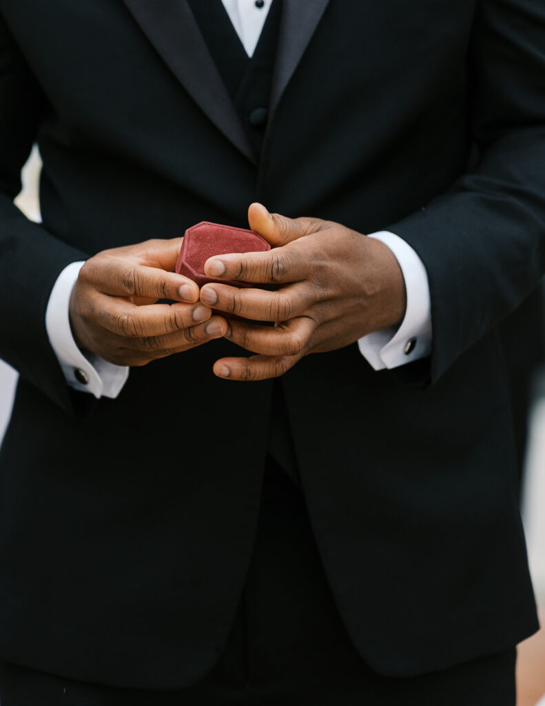 Exchanging rings at ceremony.  Summer Wedding Venue New Jersey