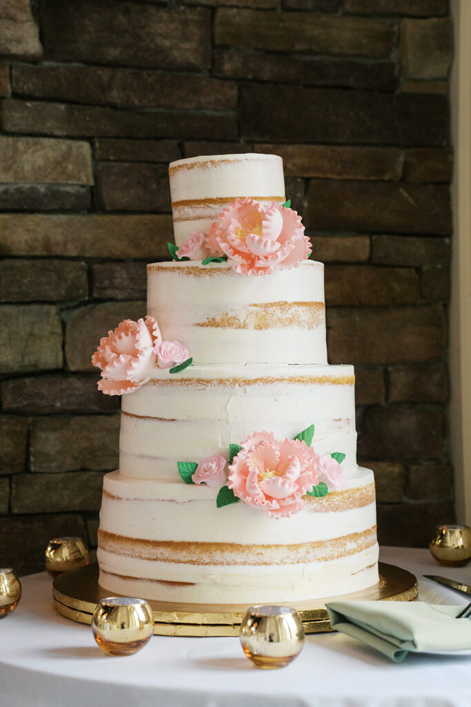 Four tier cake with sugar peony flowers