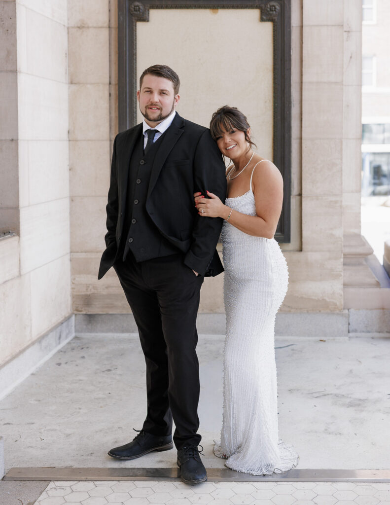 Man in black suit and women in white long gown, Reno Engagement Photos with Simone Jaramillo Photography